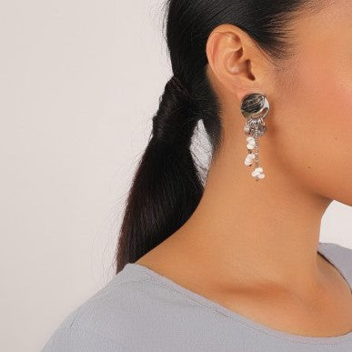 Silver earrings made of various shells