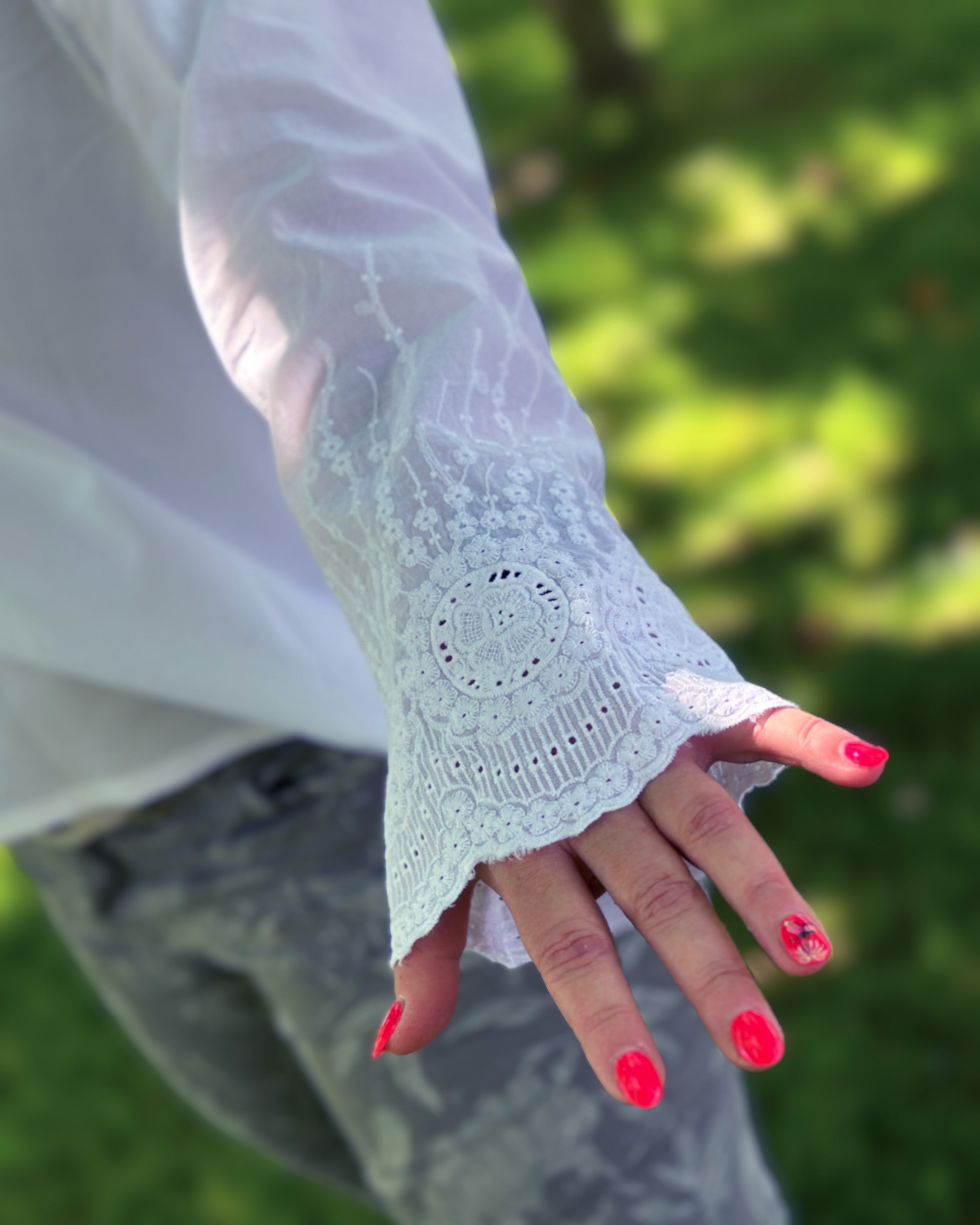 White blouse fabric embroidery border