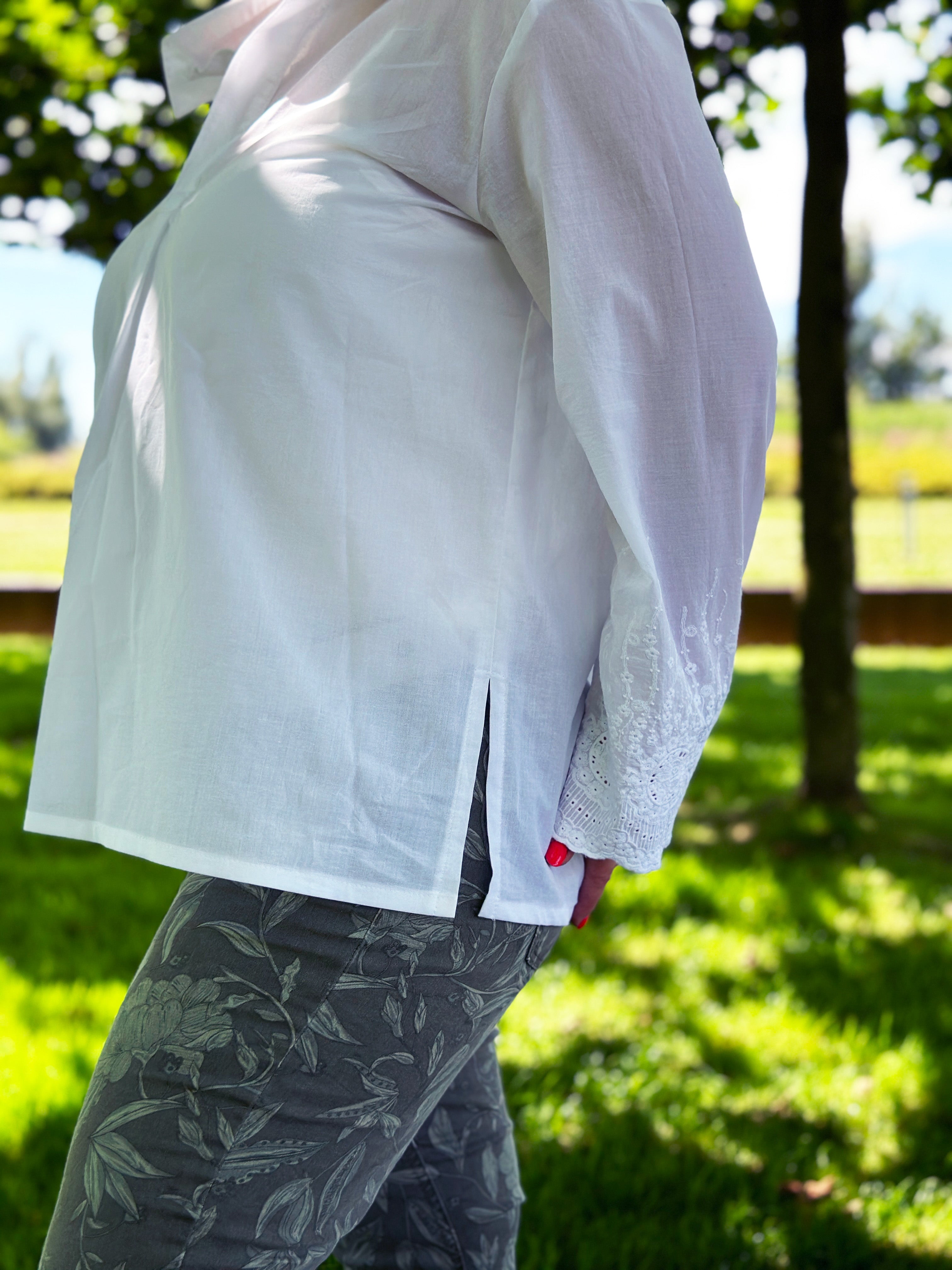 White blouse fabric embroidery border