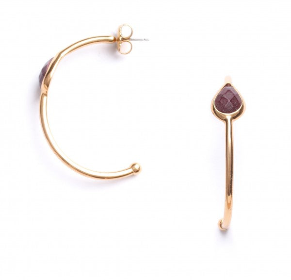 Large golden hoop earrings with stone