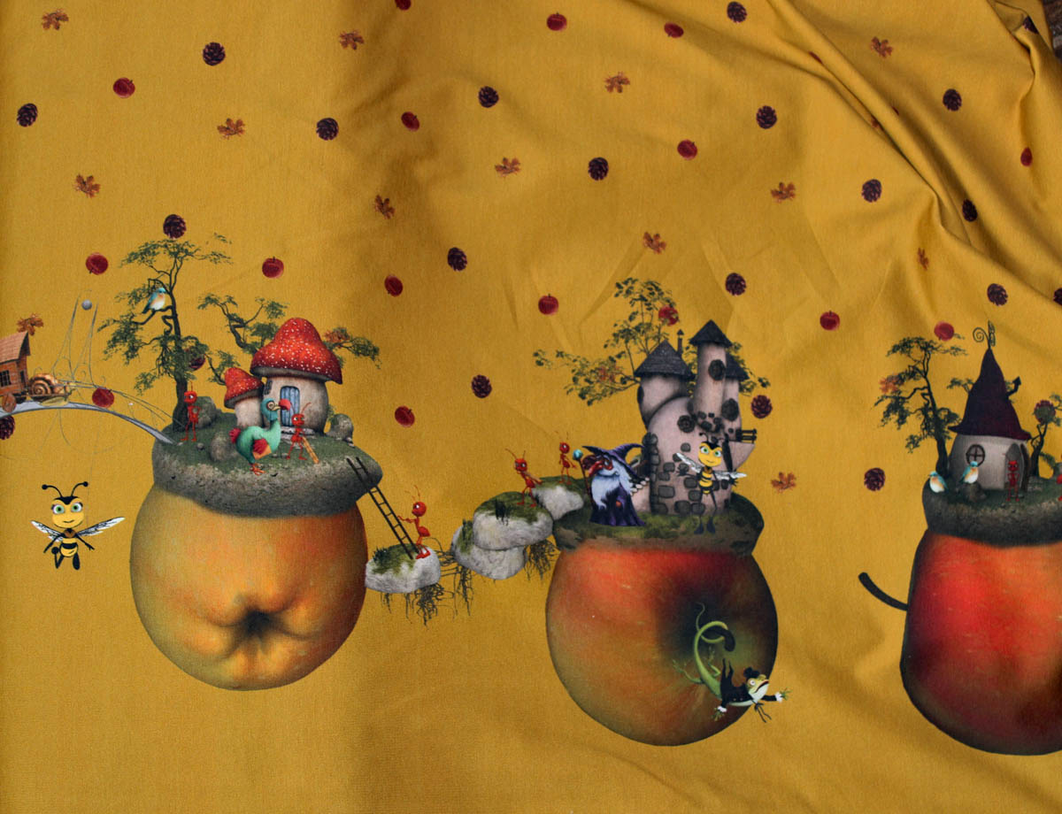 Ochre yellow Stenzo cotton jersey with funny apple motifs as border 